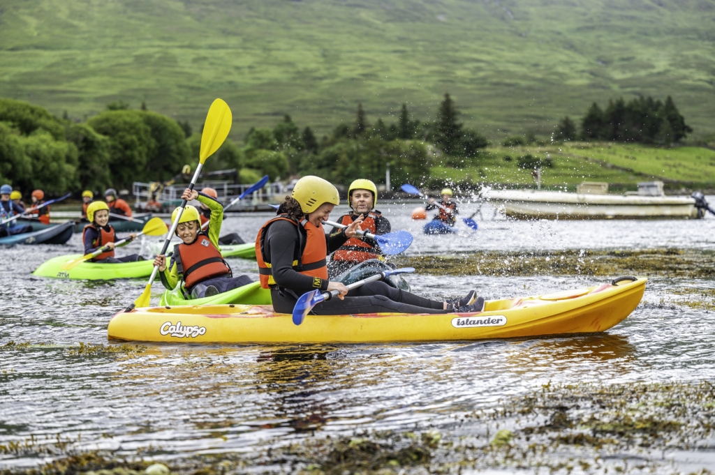 family kayaking together - family holidays ireland