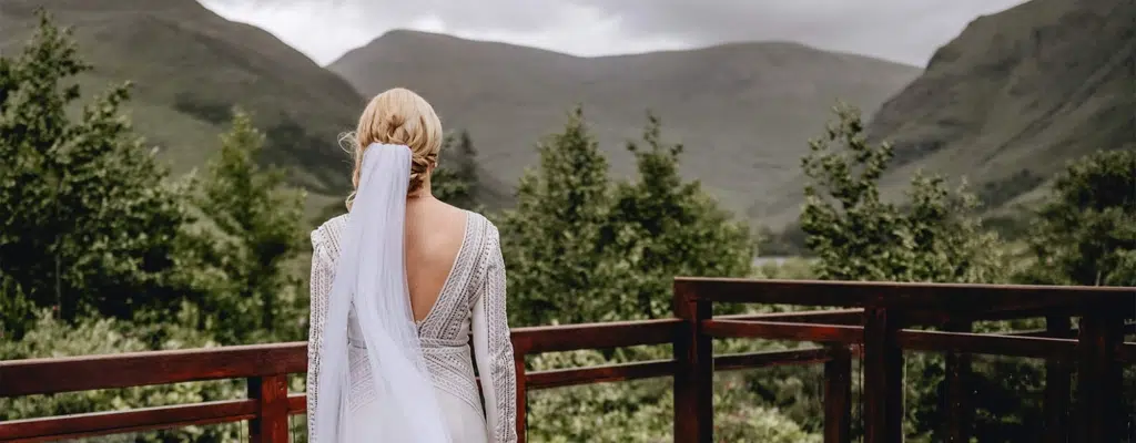 bride looking at the mountains