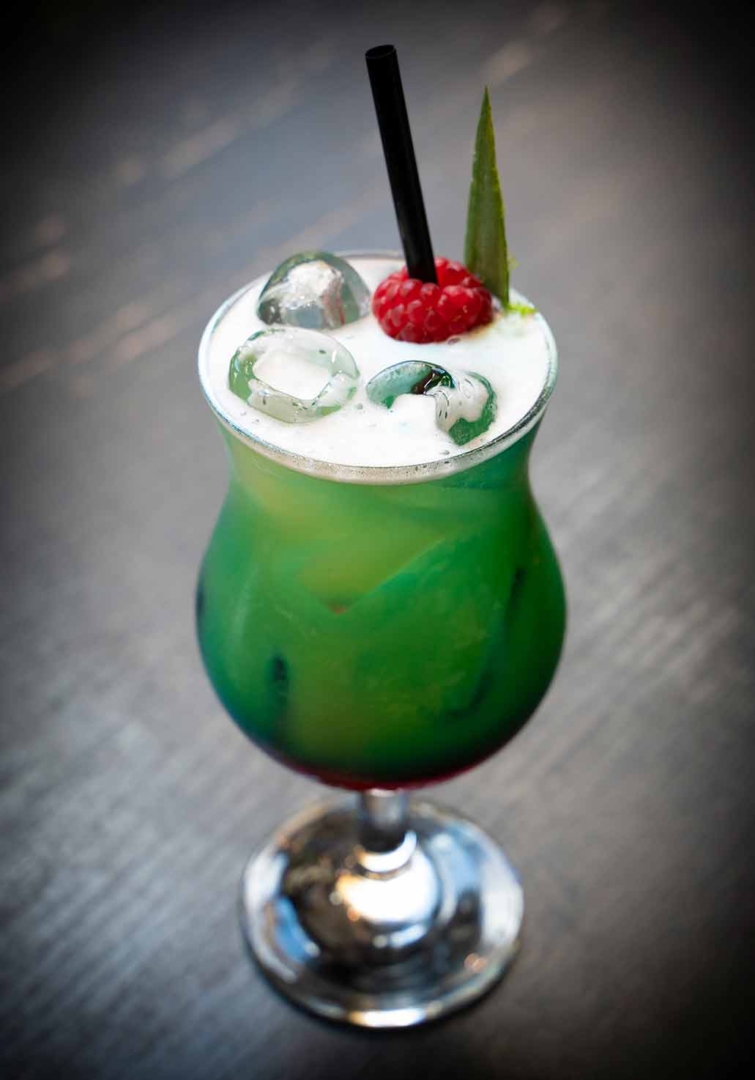 blue cocktail with fruits