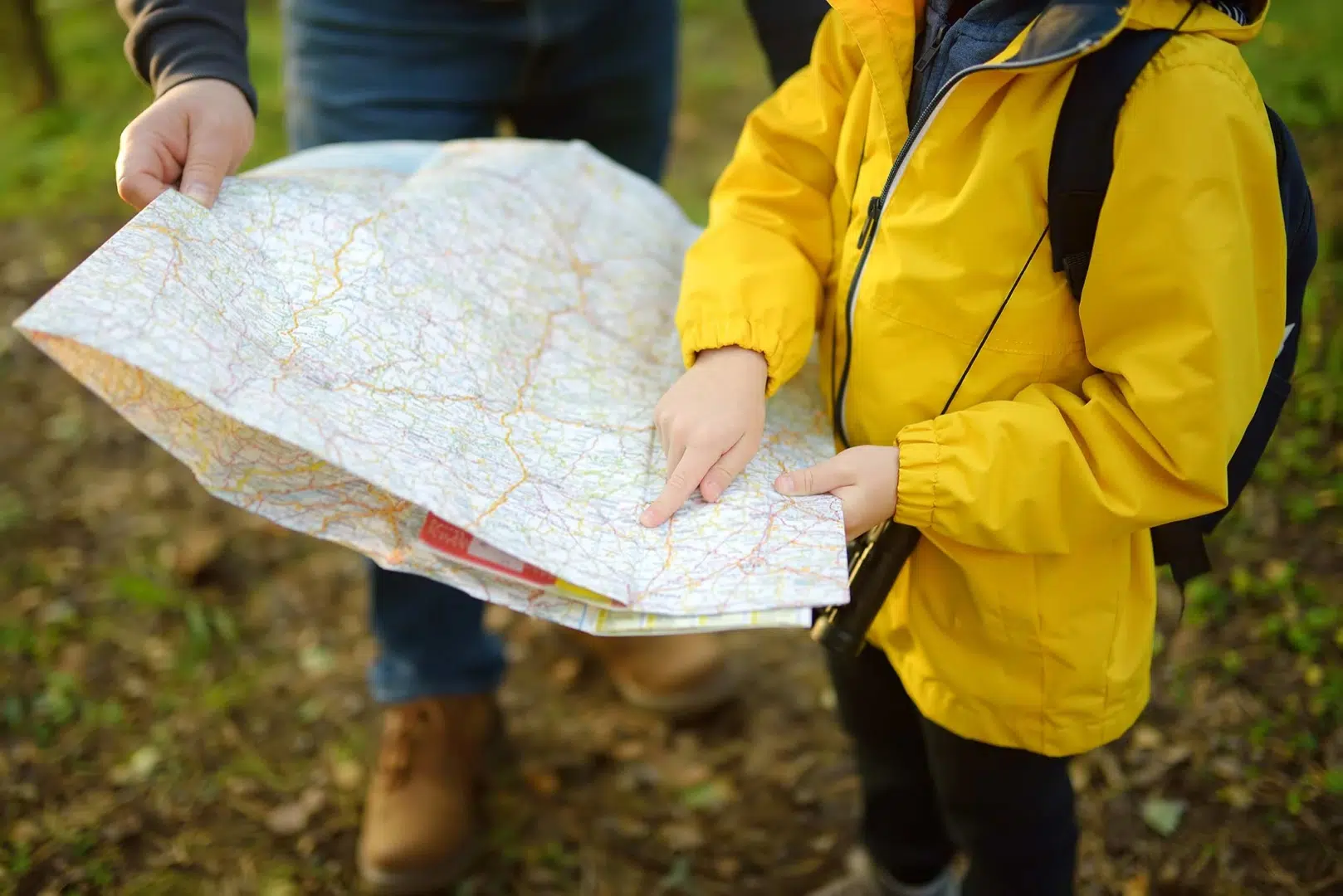 kid reading map - orienteering