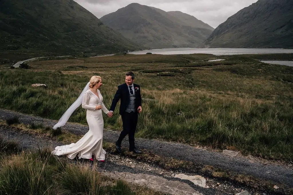 bride & groom walking in Irish countryside