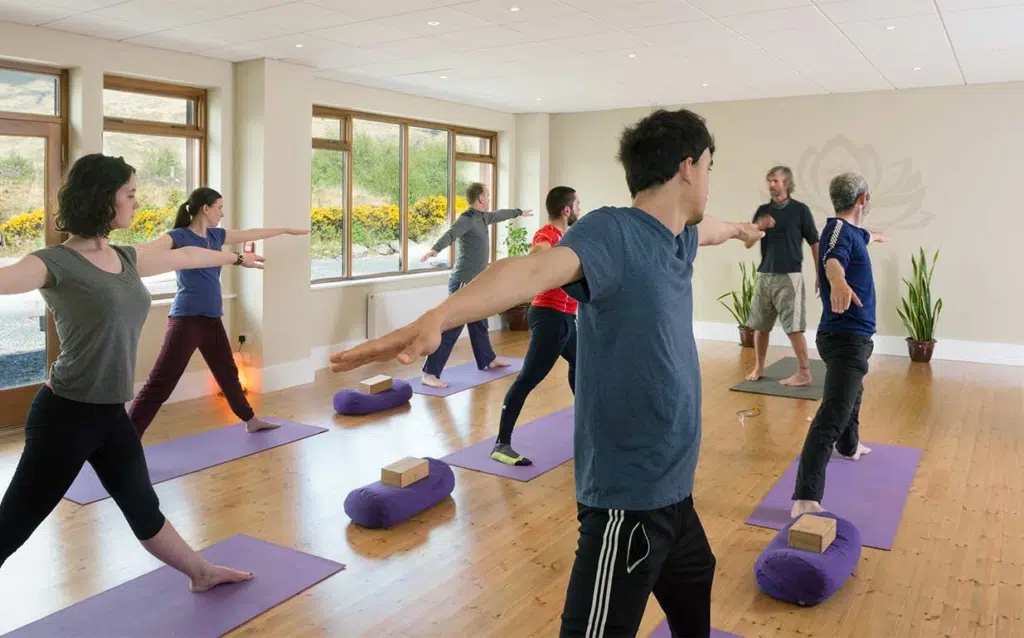 group practicing Yoga