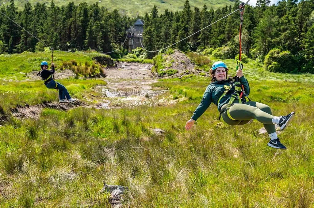 2 people ziplining